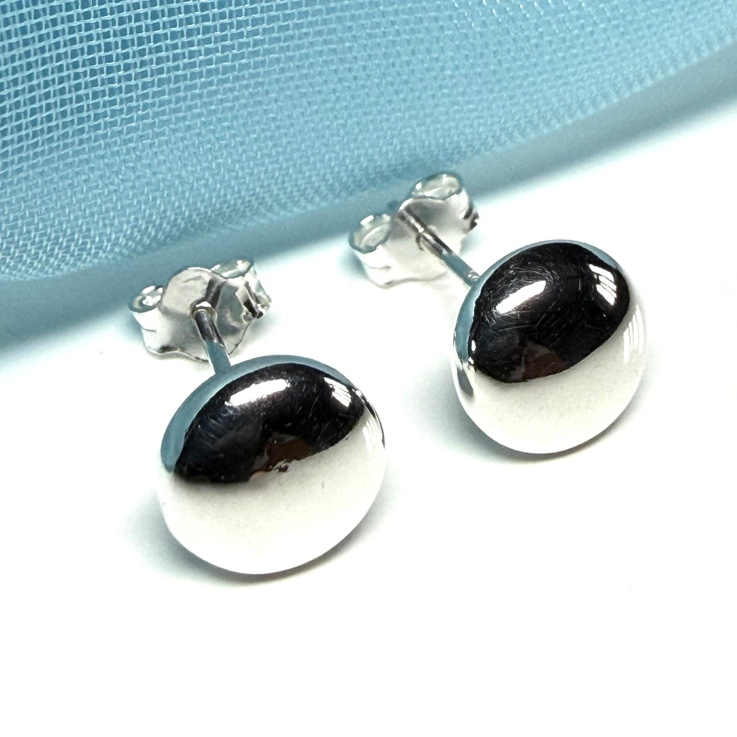 Button shaped stud earrings sterling silver, plain polished
