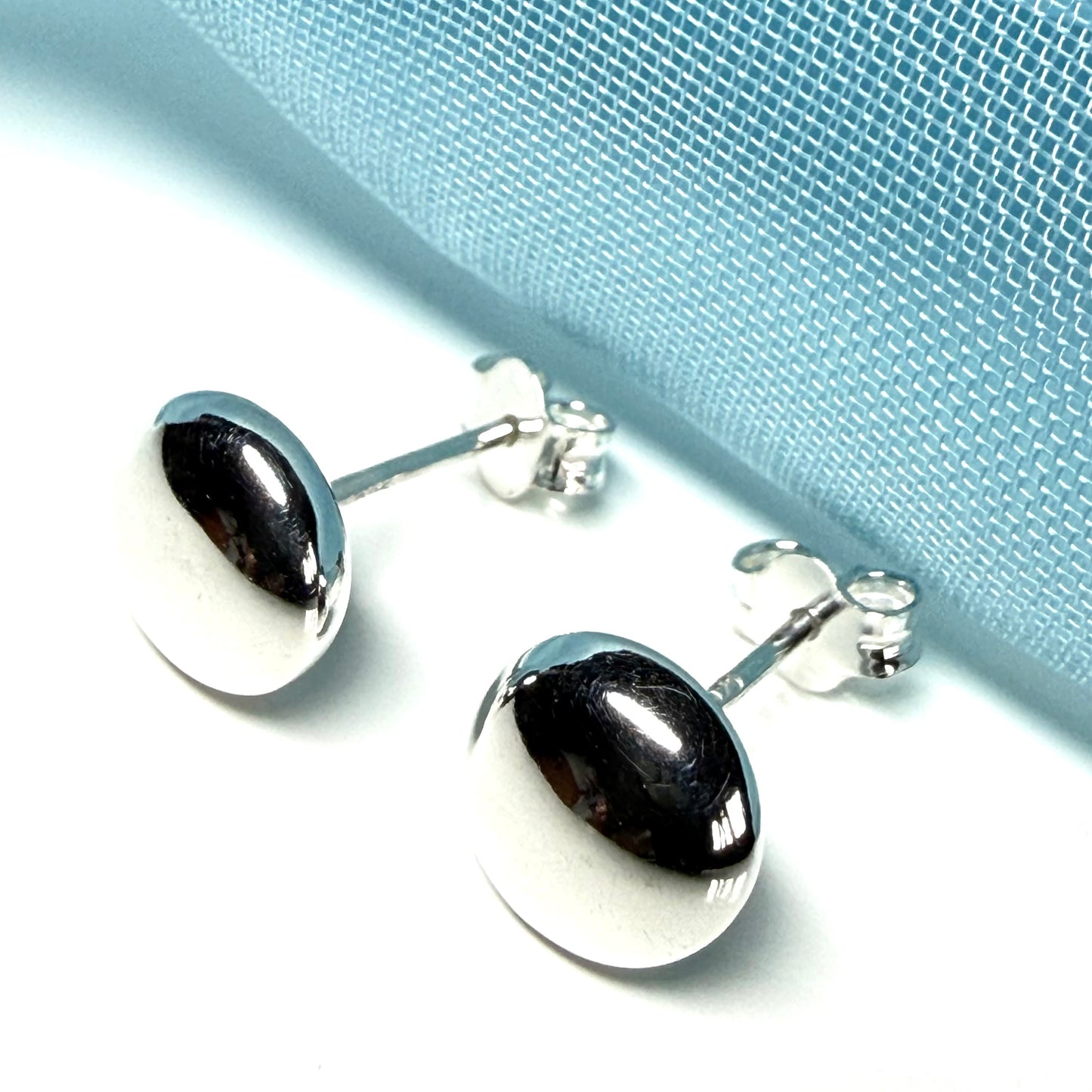 Button shaped stud earrings sterling silver, plain polished