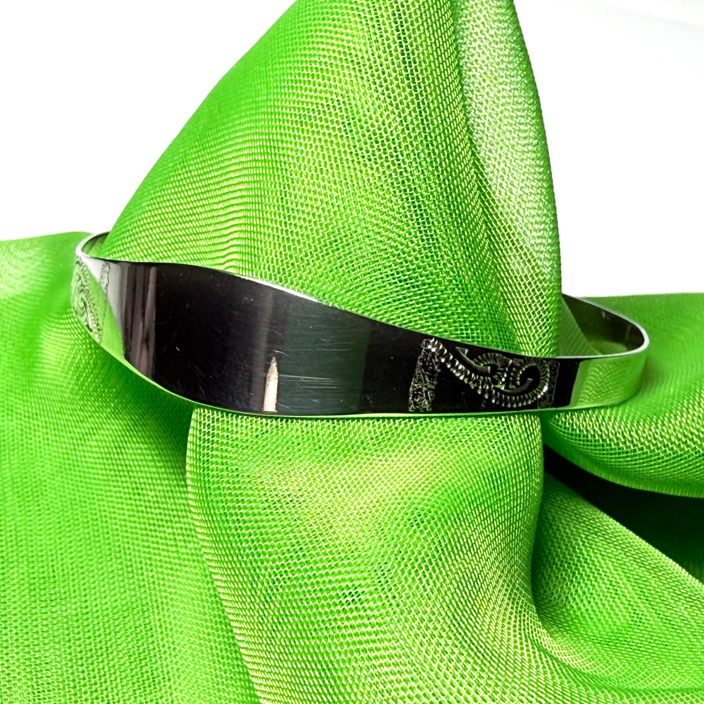 Childs expanding bangle identity designed swirl patterned sterling silver