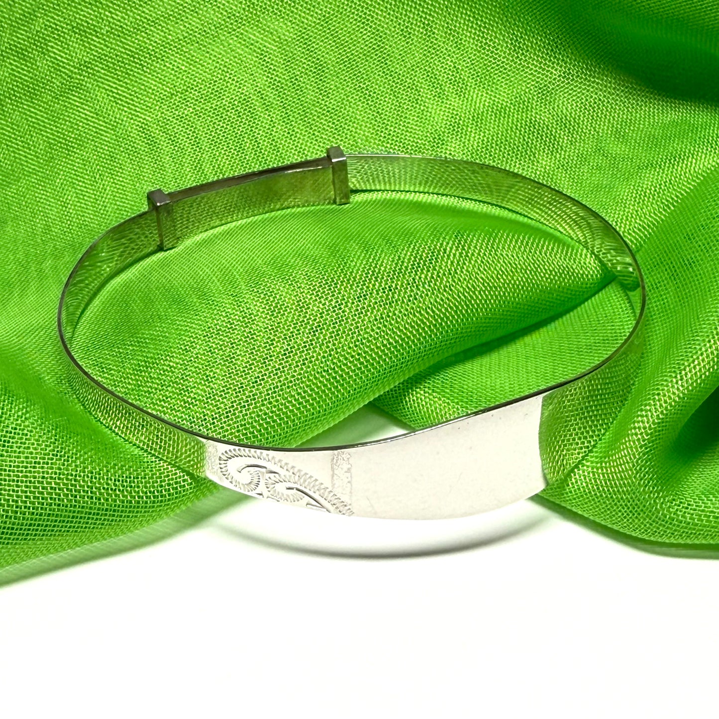 Childs expanding bangle identity designed swirl patterned sterling silver