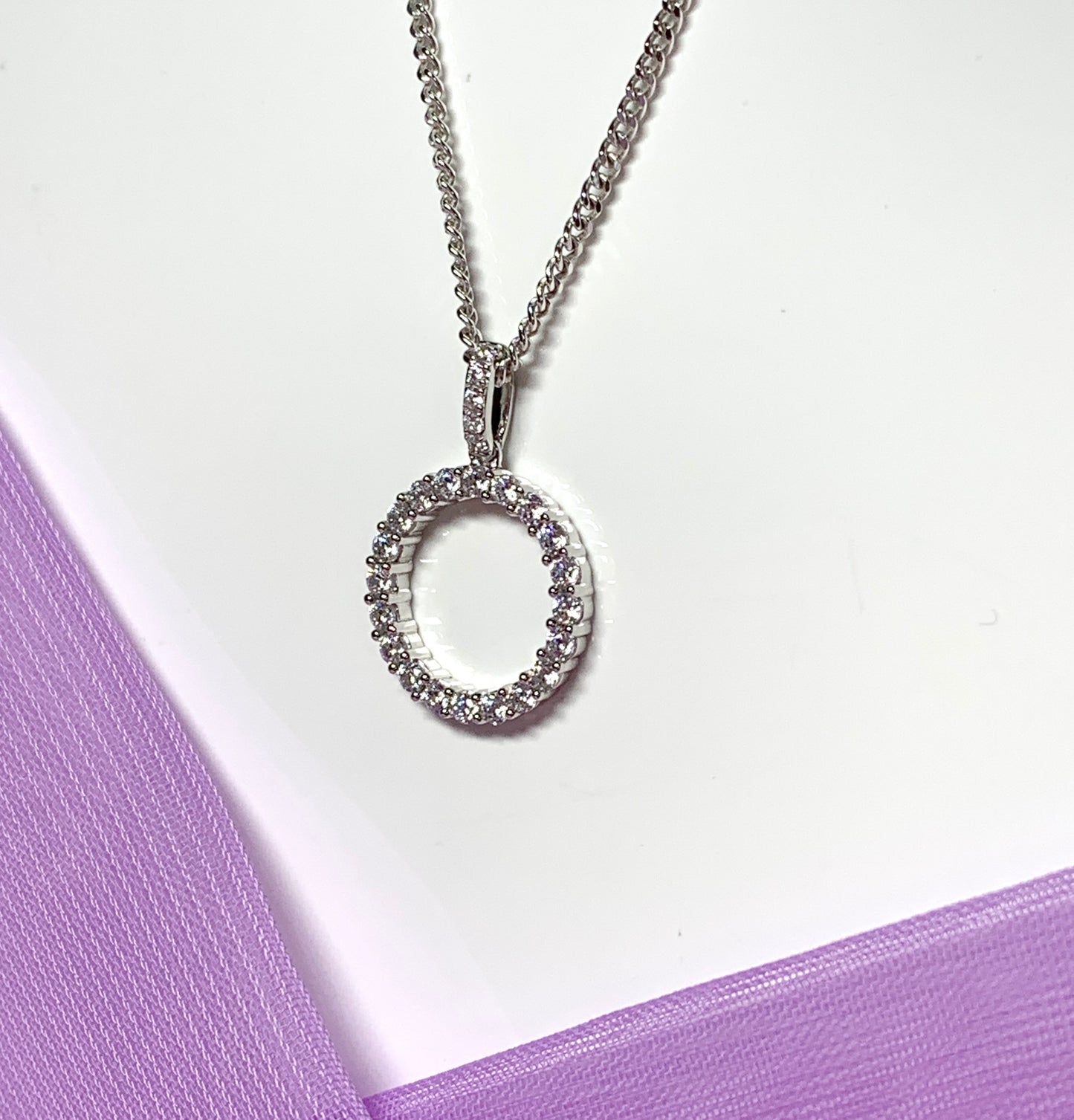 Circle of Life round necklace cubic zirconia pendant