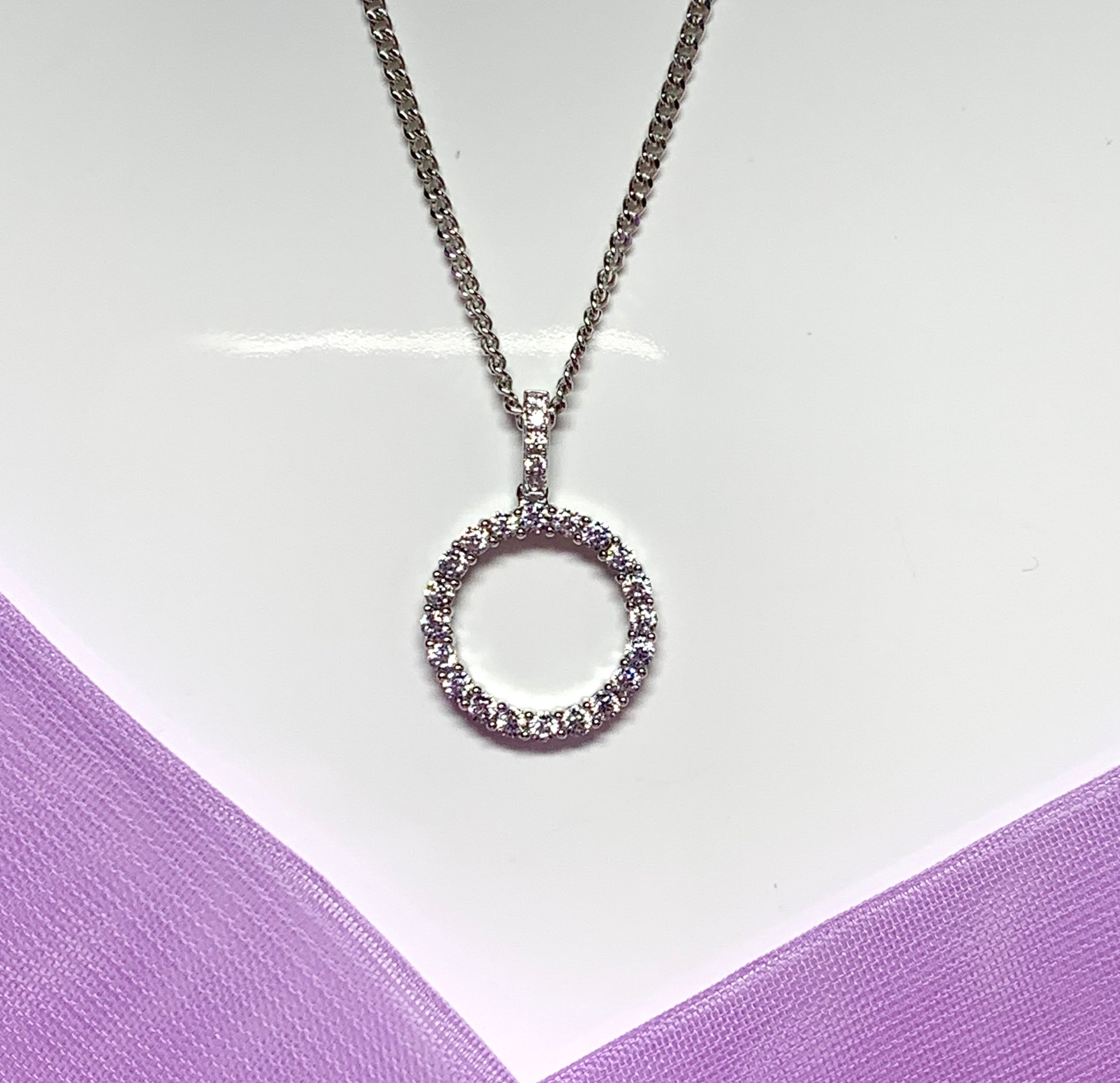 Circle of Life round necklace cubic zirconia pendant