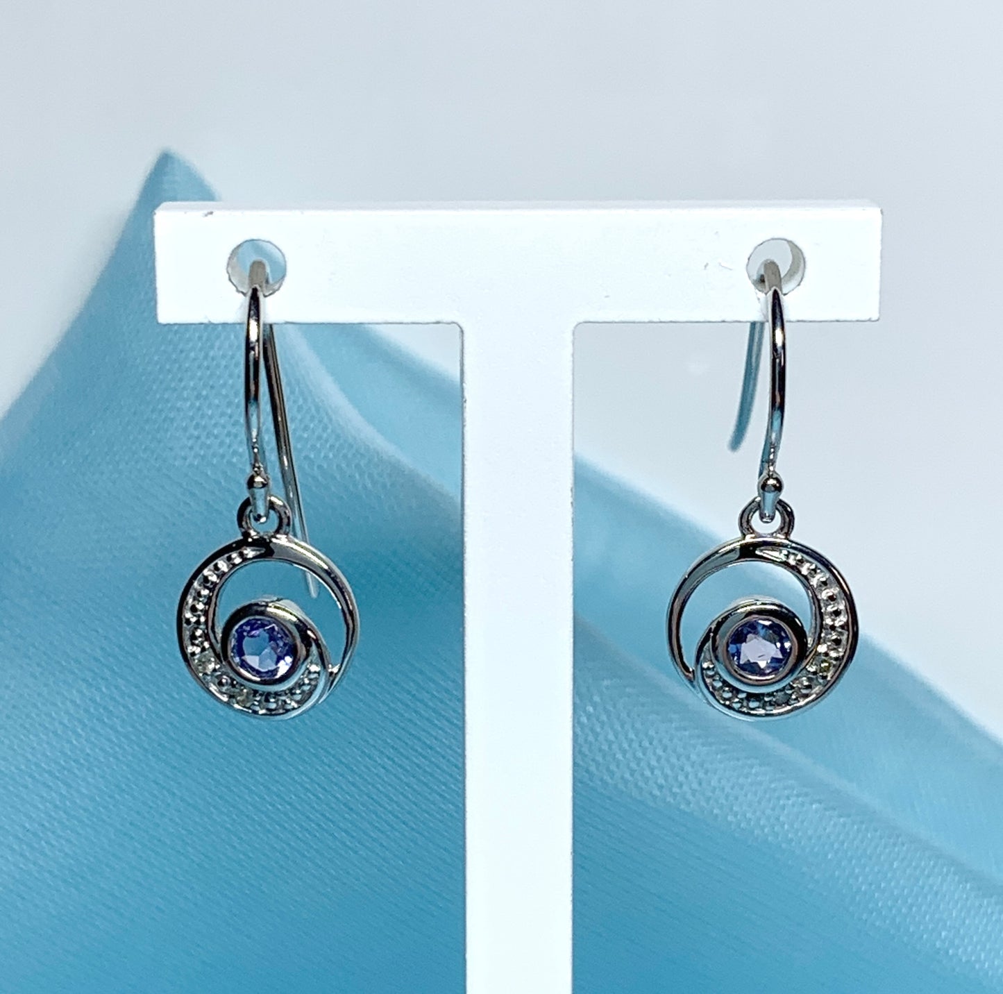 Circle tanzanite and diamond white gold drop earrings