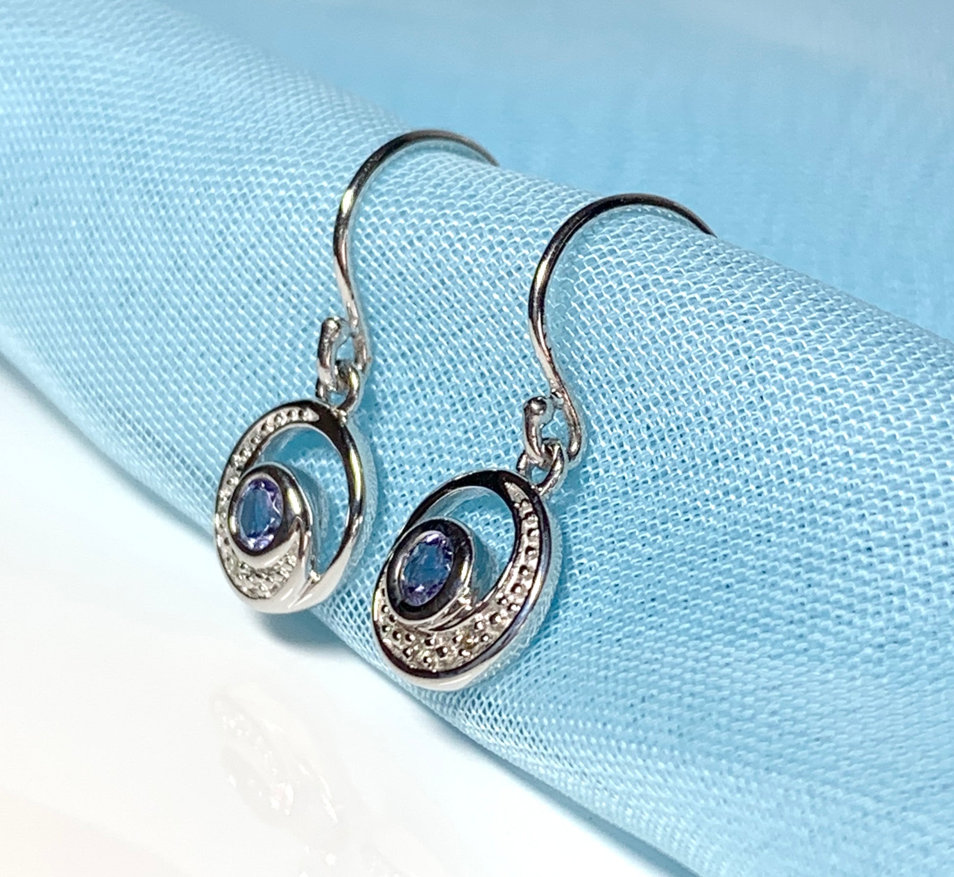 Circle tanzanite and diamond white gold drop earrings