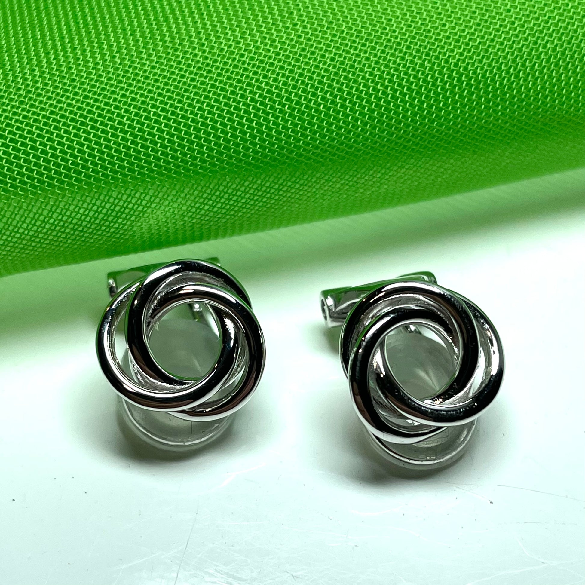 Clip on earrings sterling silver open knot design