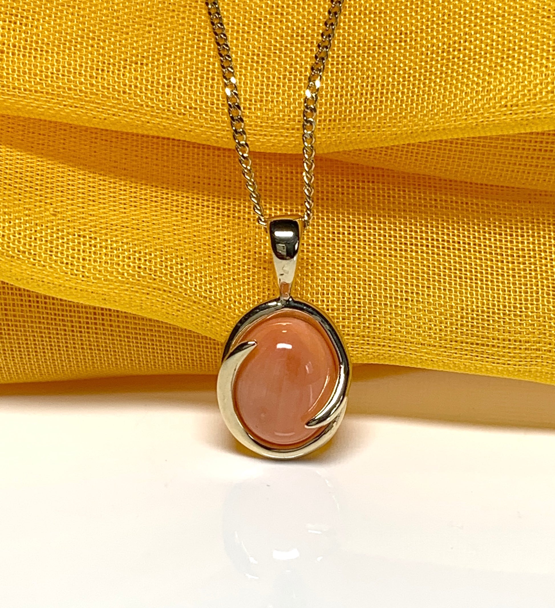 Coral yellow gold fancy oval necklace