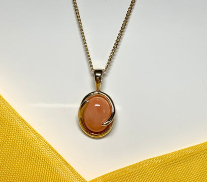 Coral yellow gold fancy oval necklace