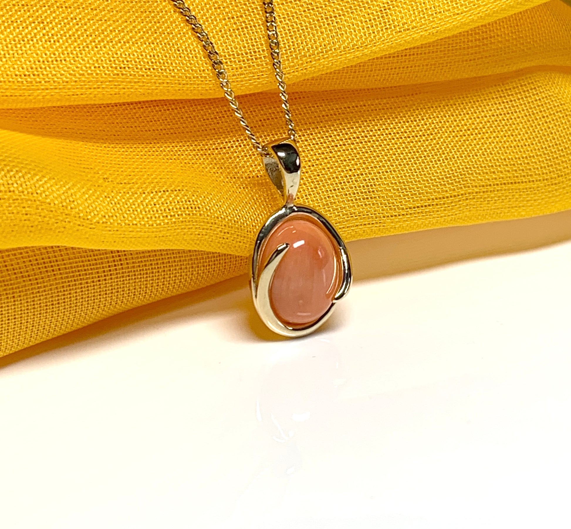 Coral yellow gold fancy oval necklace