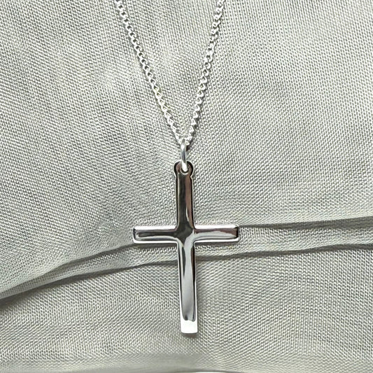 Cross and chain highly polished with a round pendant loop on top