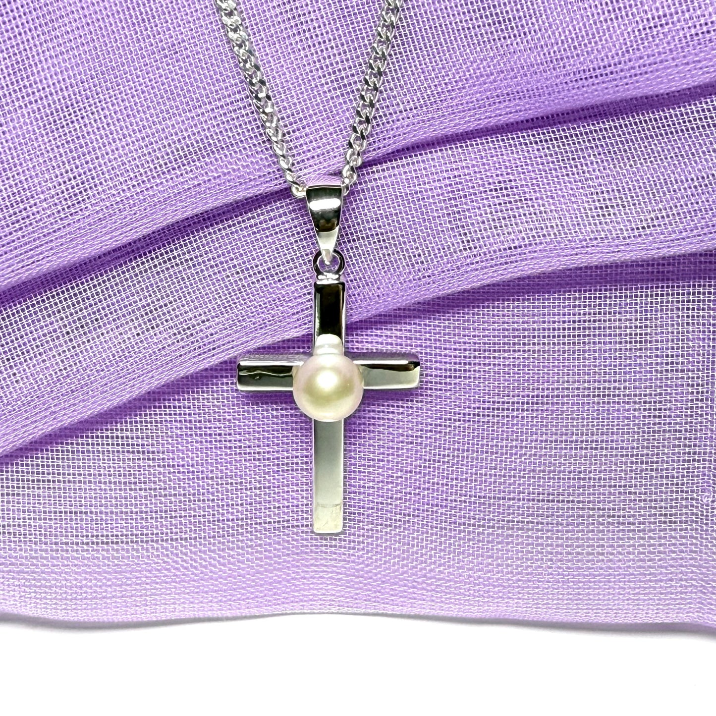 Cross necklace with a real freshwater pearl in the middle sterling silver including a chain