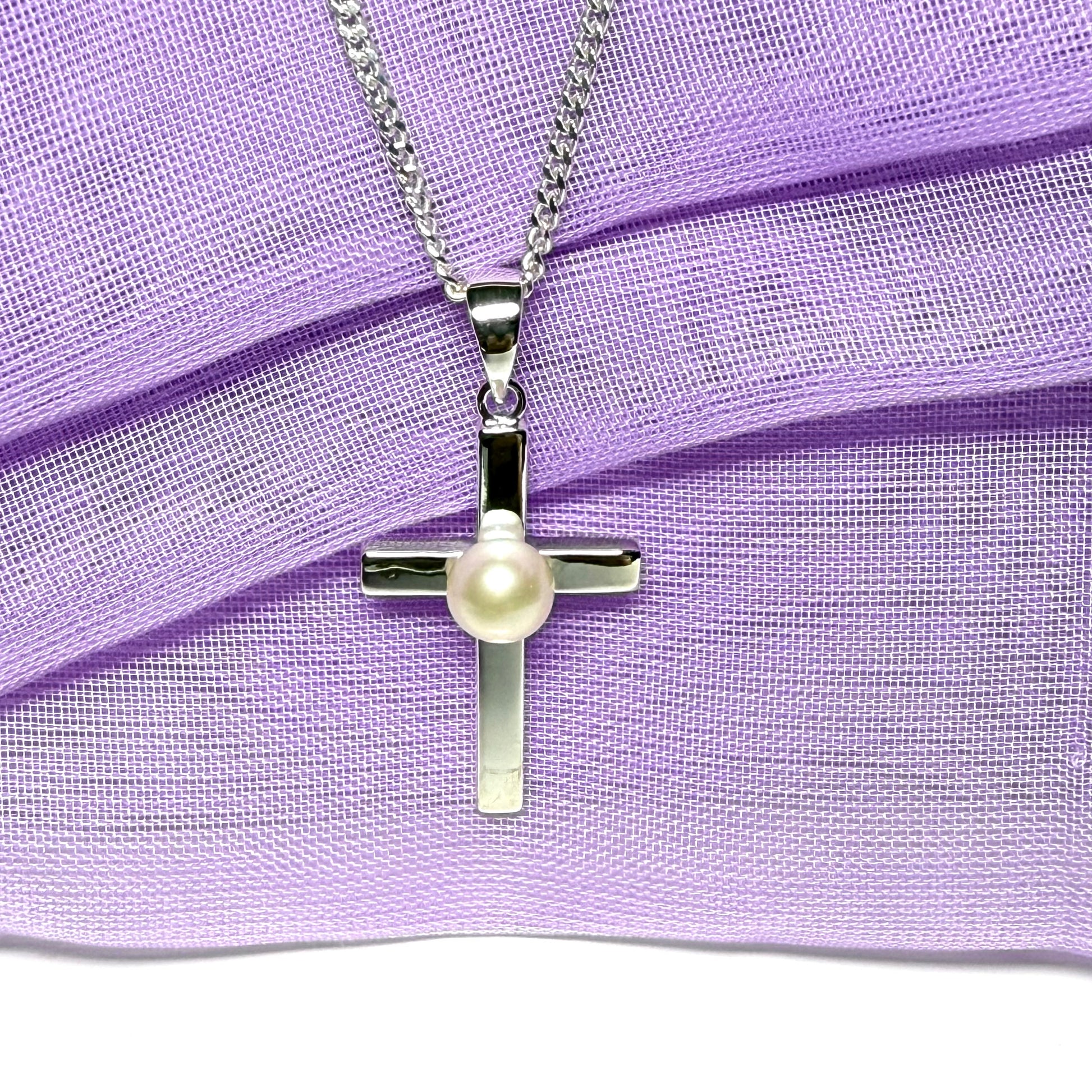 Cross necklace with a real freshwater pearl in the middle sterling silver including a chain