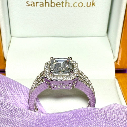 Cubic zirconia sterling silver emerald cut fancy dress ring