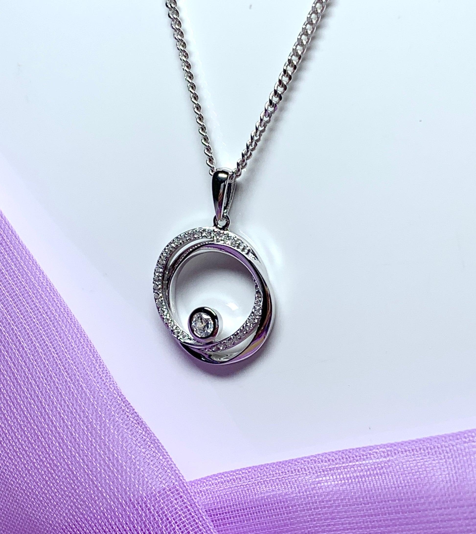 Cubic zirconia round necklace swirl pendant Circle of Life