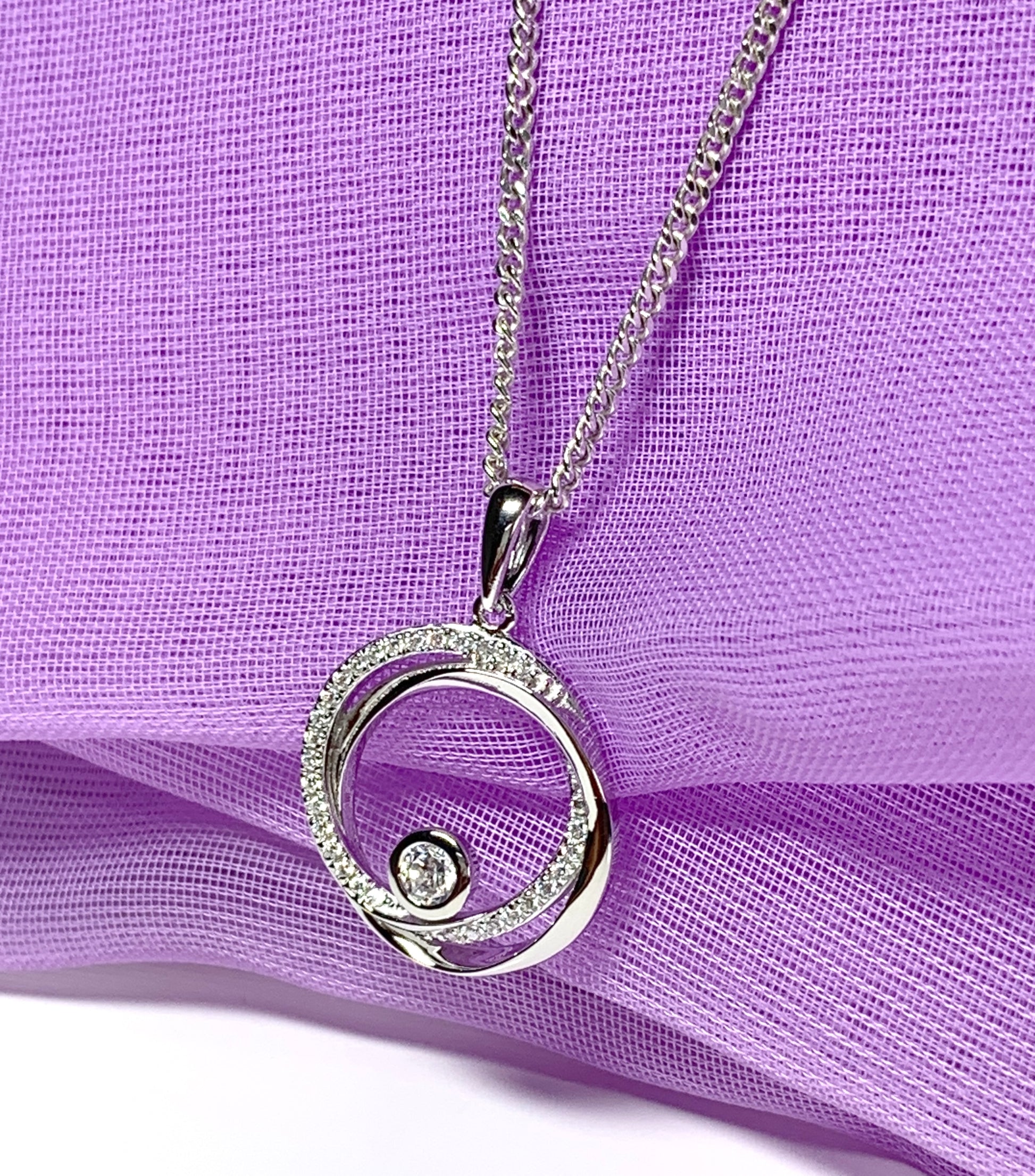 Cubic zirconia round necklace swirl pendant Circle of Life