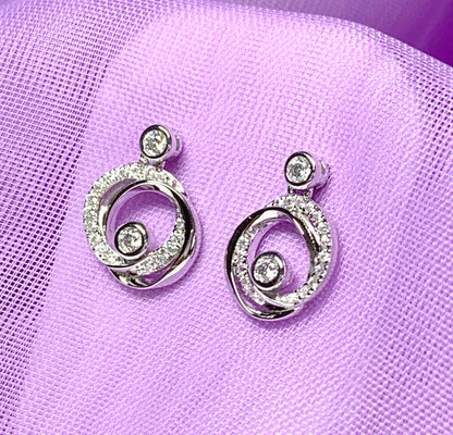 Cubic zirconia round swirl stud earrings