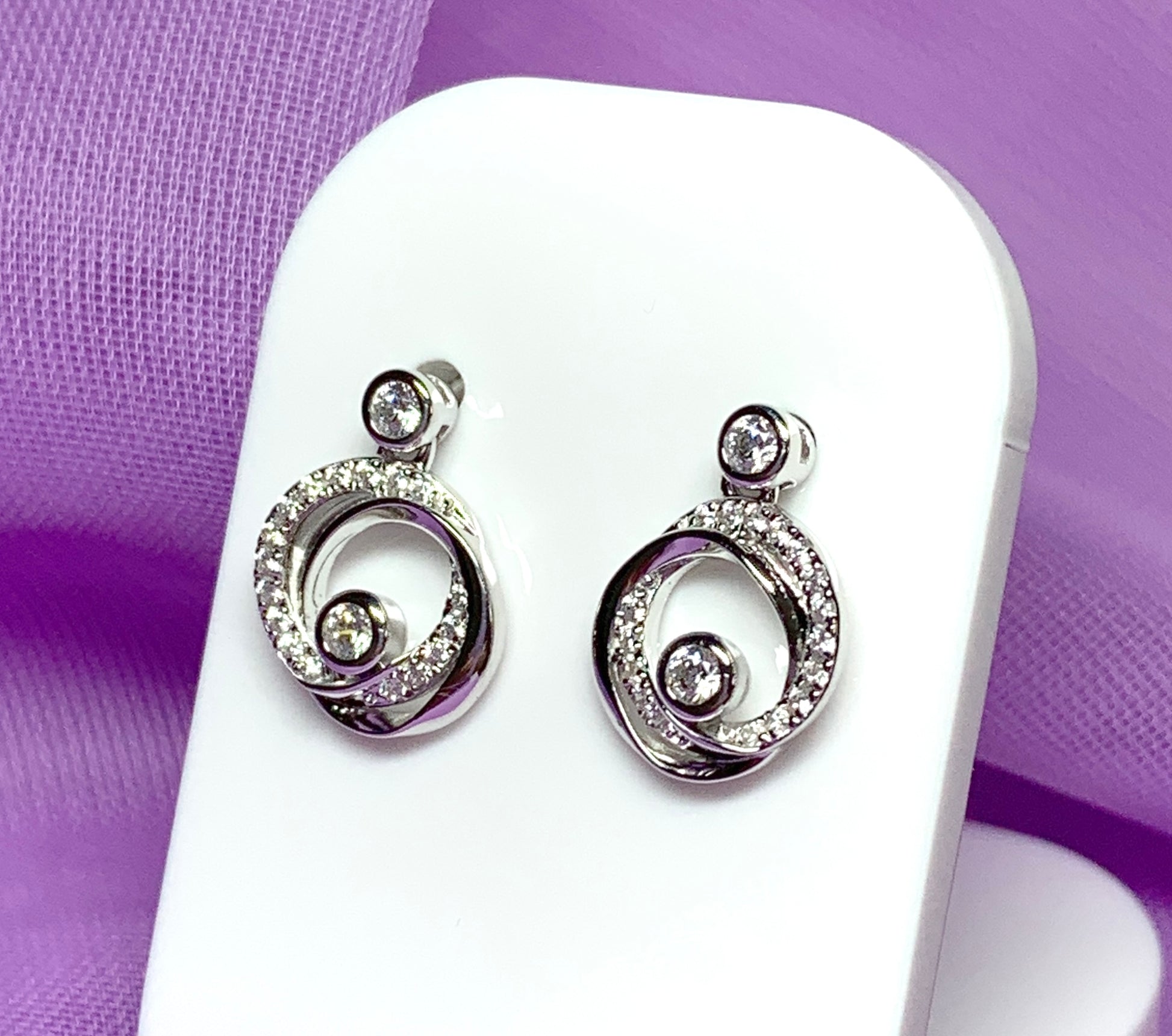 Cubic zirconia round swirl stud earrings