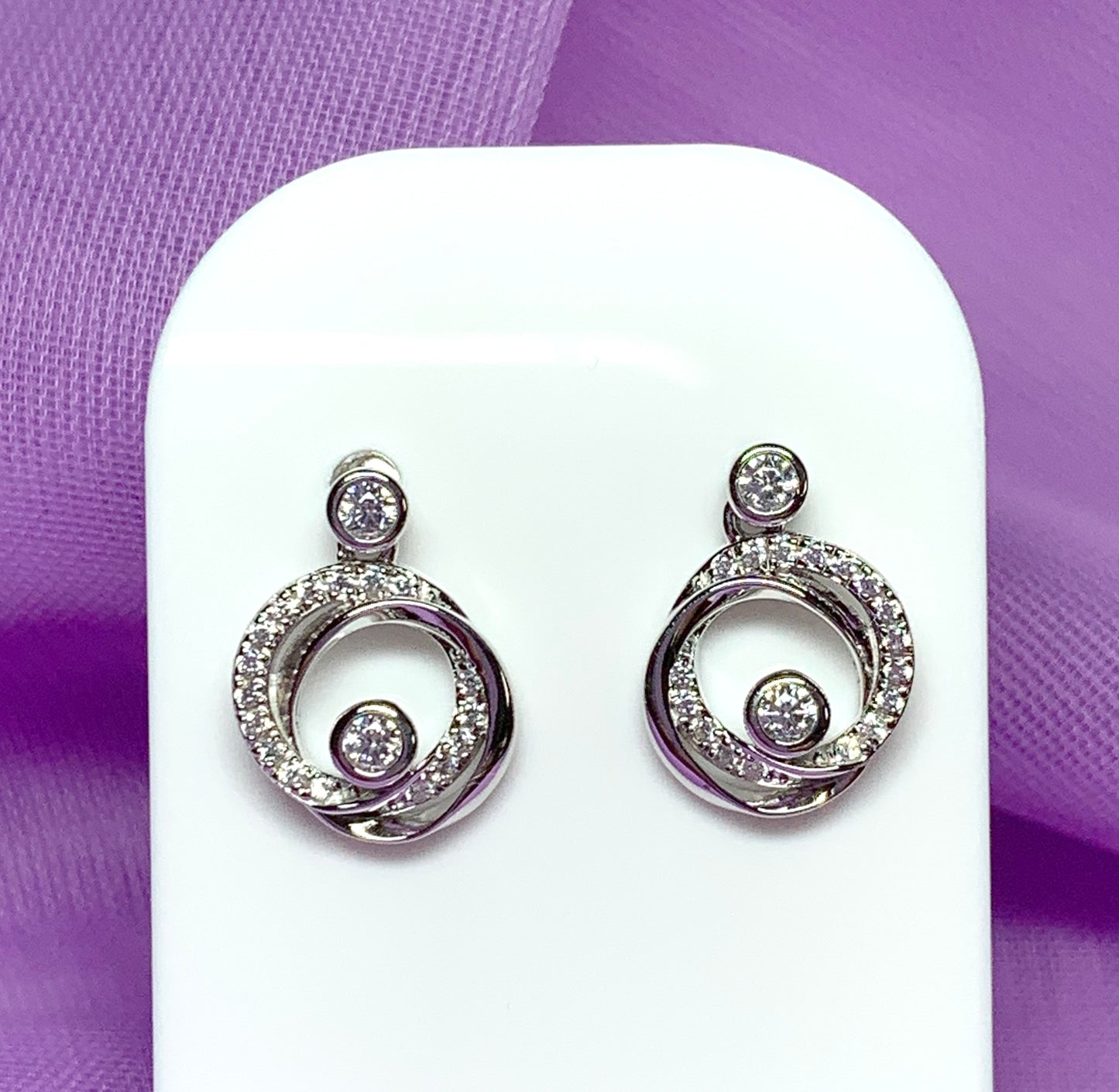 Cubic zirconia round swirl stud earrings