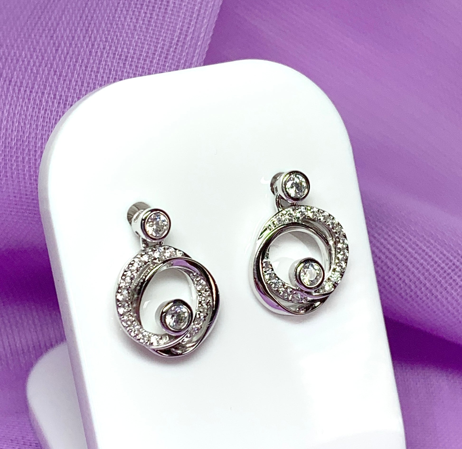 Cubic zirconia round swirl stud earrings