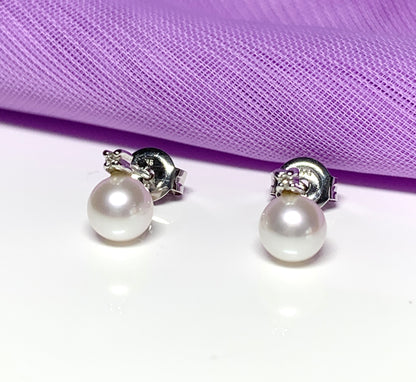 Cultured pearl and diamond stud earrings white gold