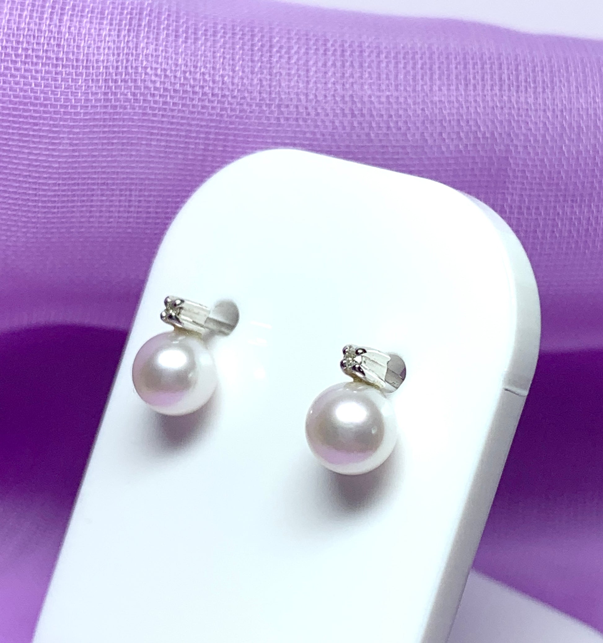 Cultured pearl and diamond stud earrings white gold