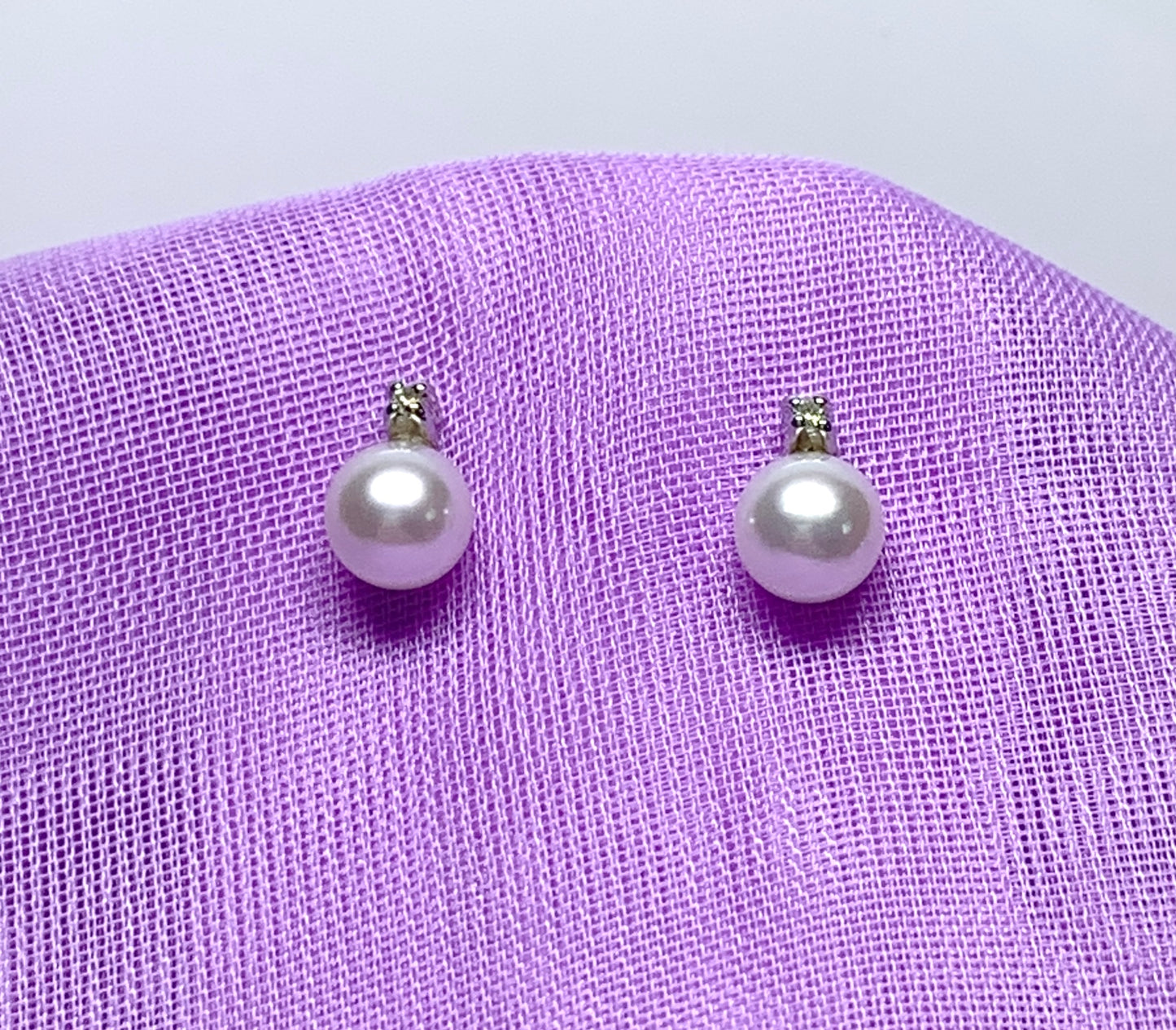 Cultured pearl and diamond stud earrings white gold