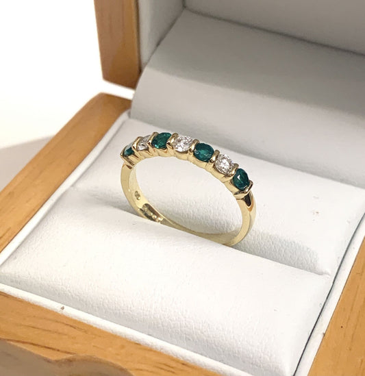Tension Bar Set Emerald And Diamond Yellow Gold Eternity Ring