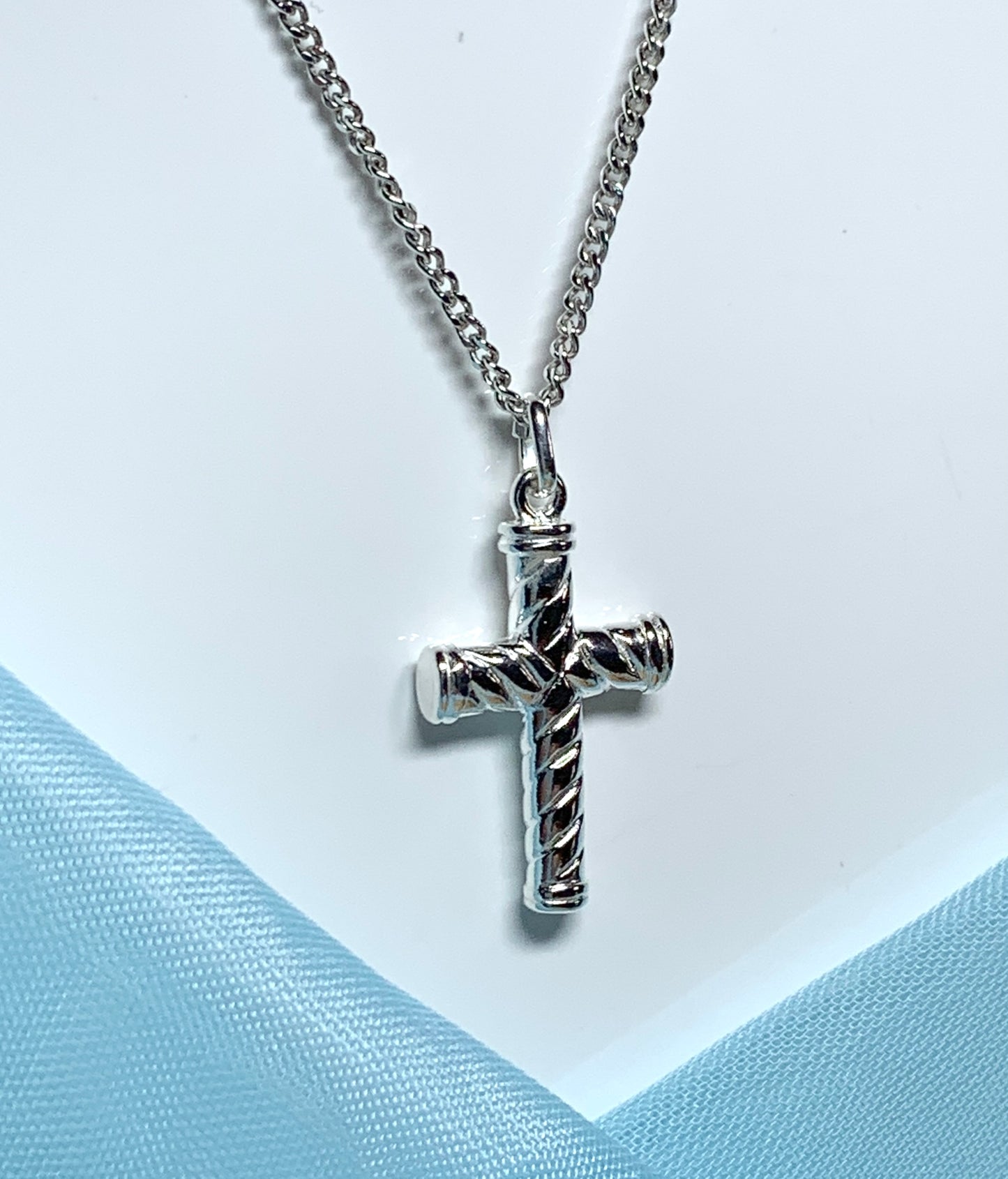 Diamond cut cross patterned sterling silver and chain