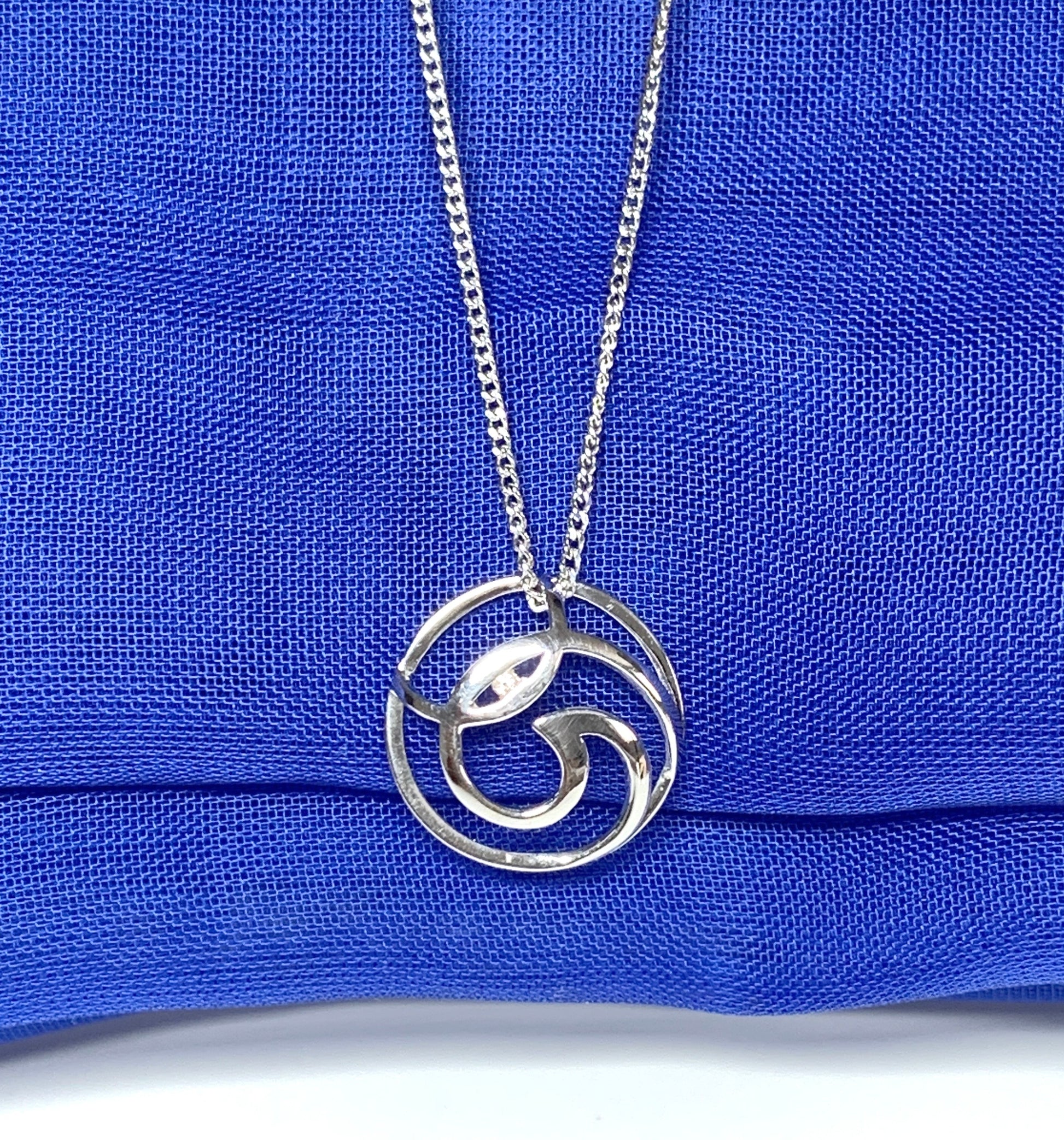 Diamond necklace white gold round open fancy swirl