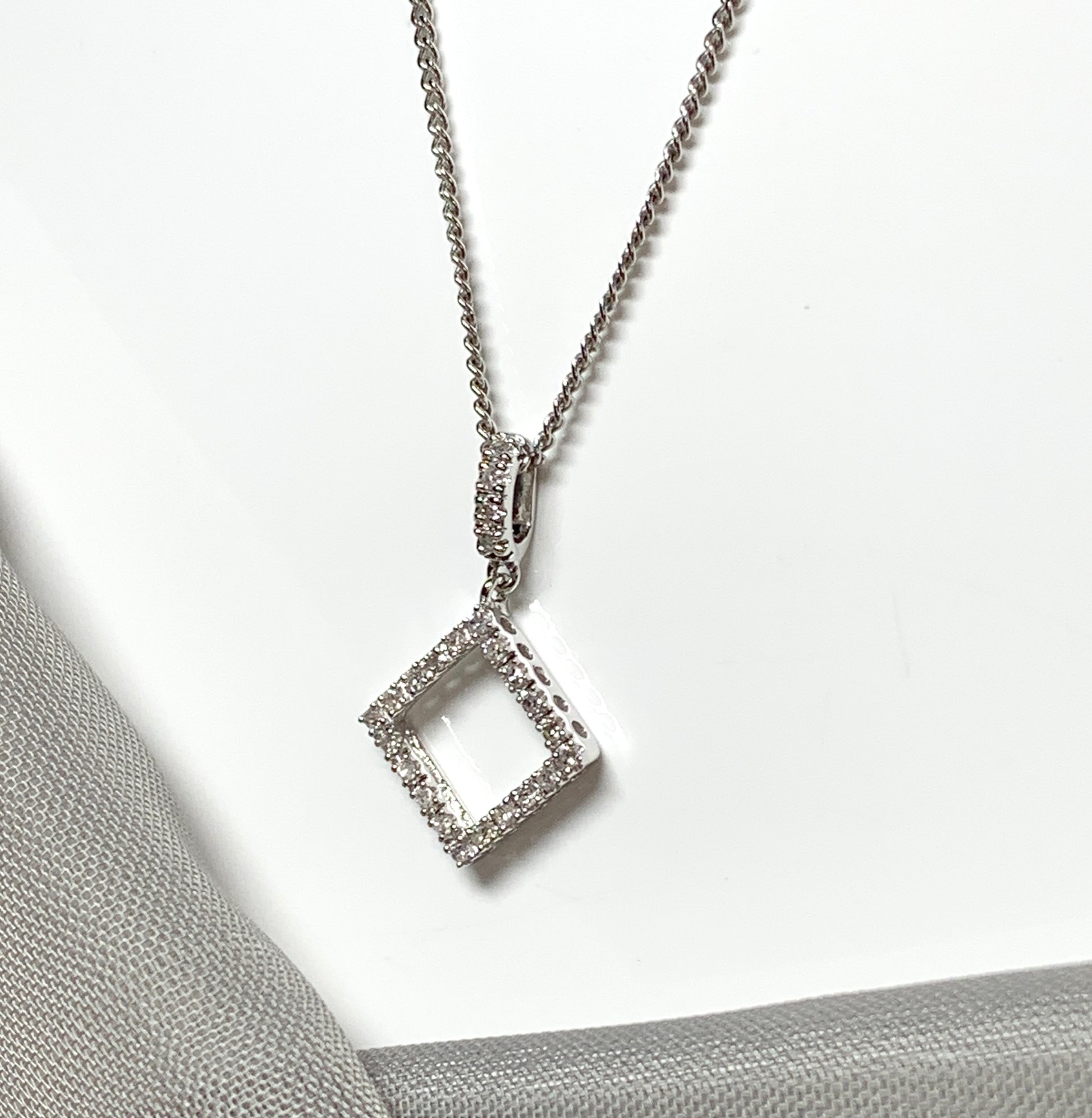 Diamond necklace white gold square shaped open fancy pendant