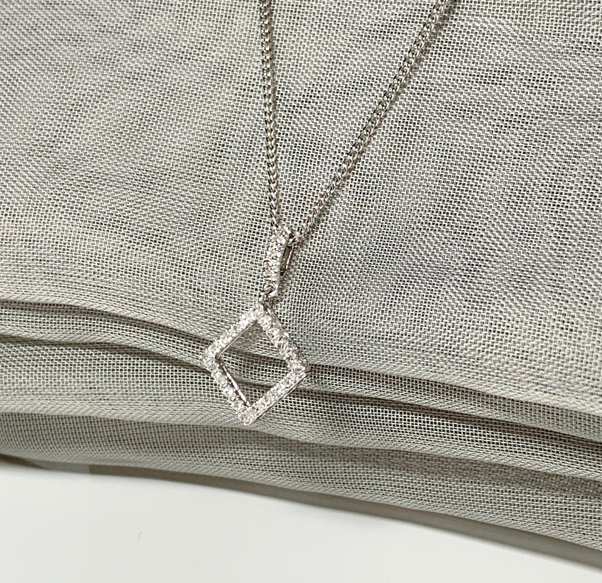 Diamond necklace white gold square shaped open fancy pendant