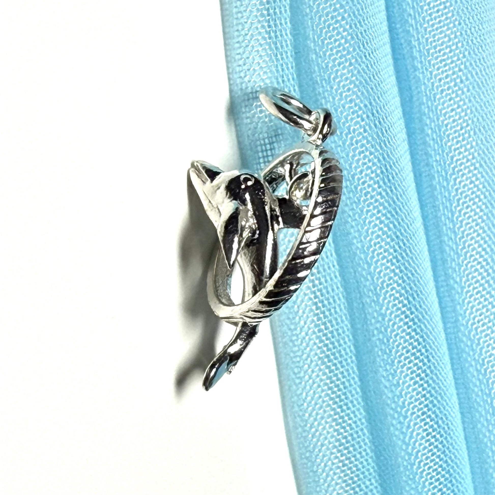 Dolphin Performing Though Hoop Sterling Silver Charm