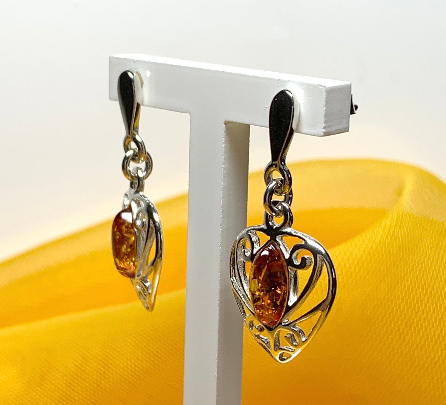 Heart shaped real amber drop earrings made in sterling silver