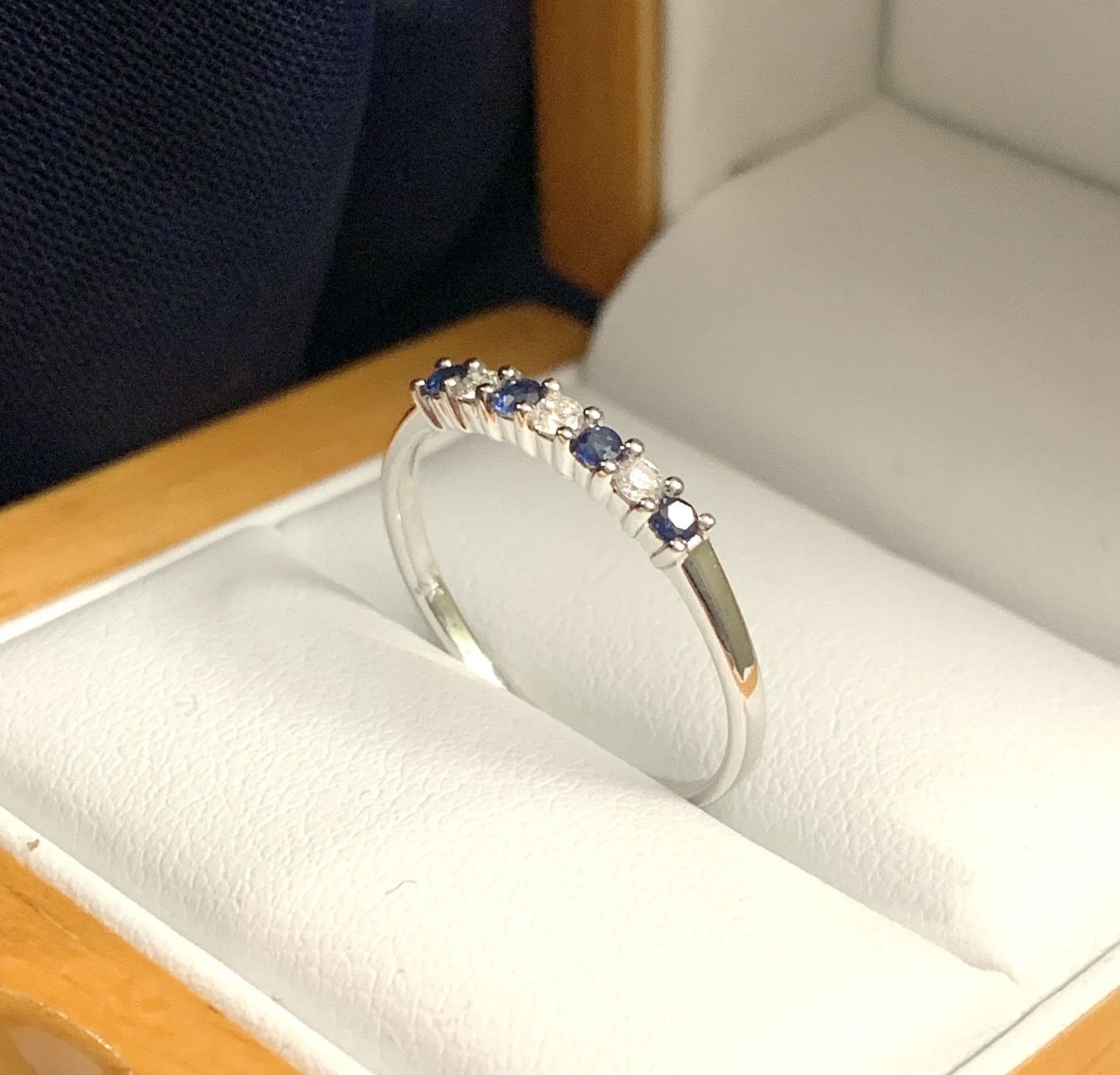 White Gold Blue Sapphire And Diamond Claw Set Eternity Ring