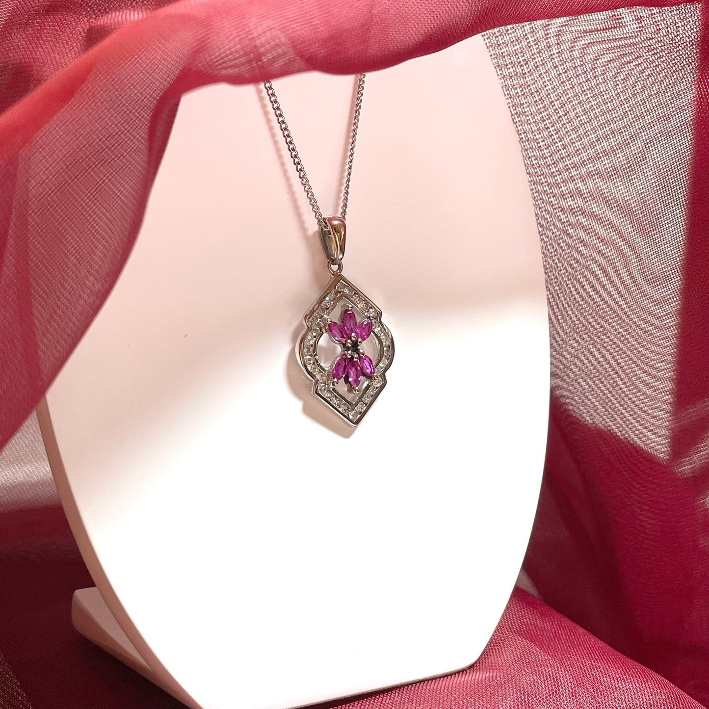 Fancy ruby and diamond white gold pendant necklace