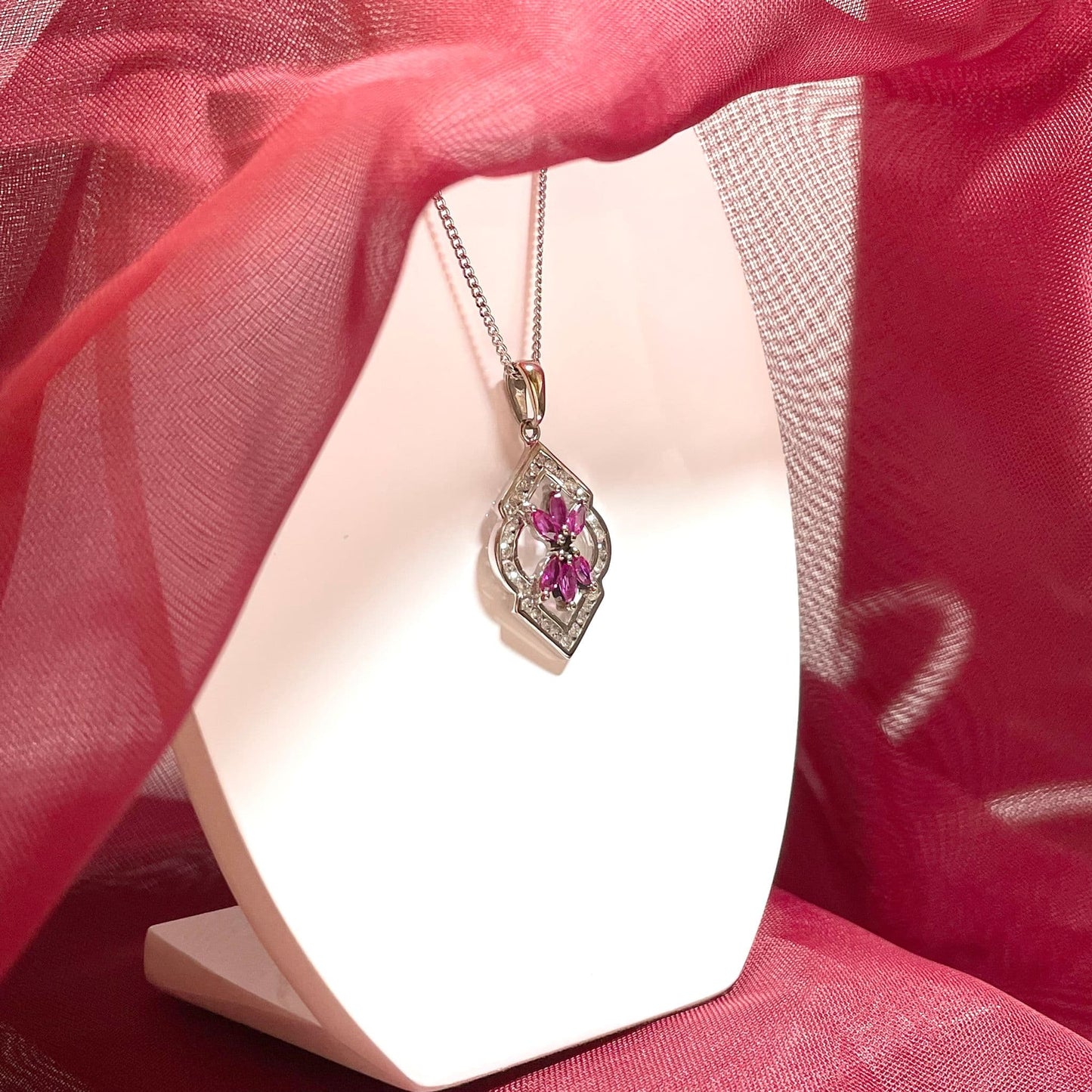 Fancy ruby and diamond white gold pendant necklace