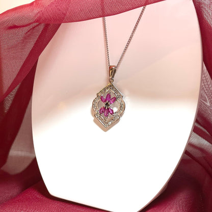 Fancy ruby and diamond white gold pendant necklace