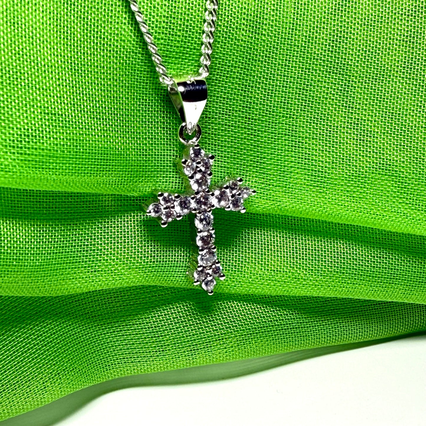 Fancy cubic zirconia set sterling silver cross