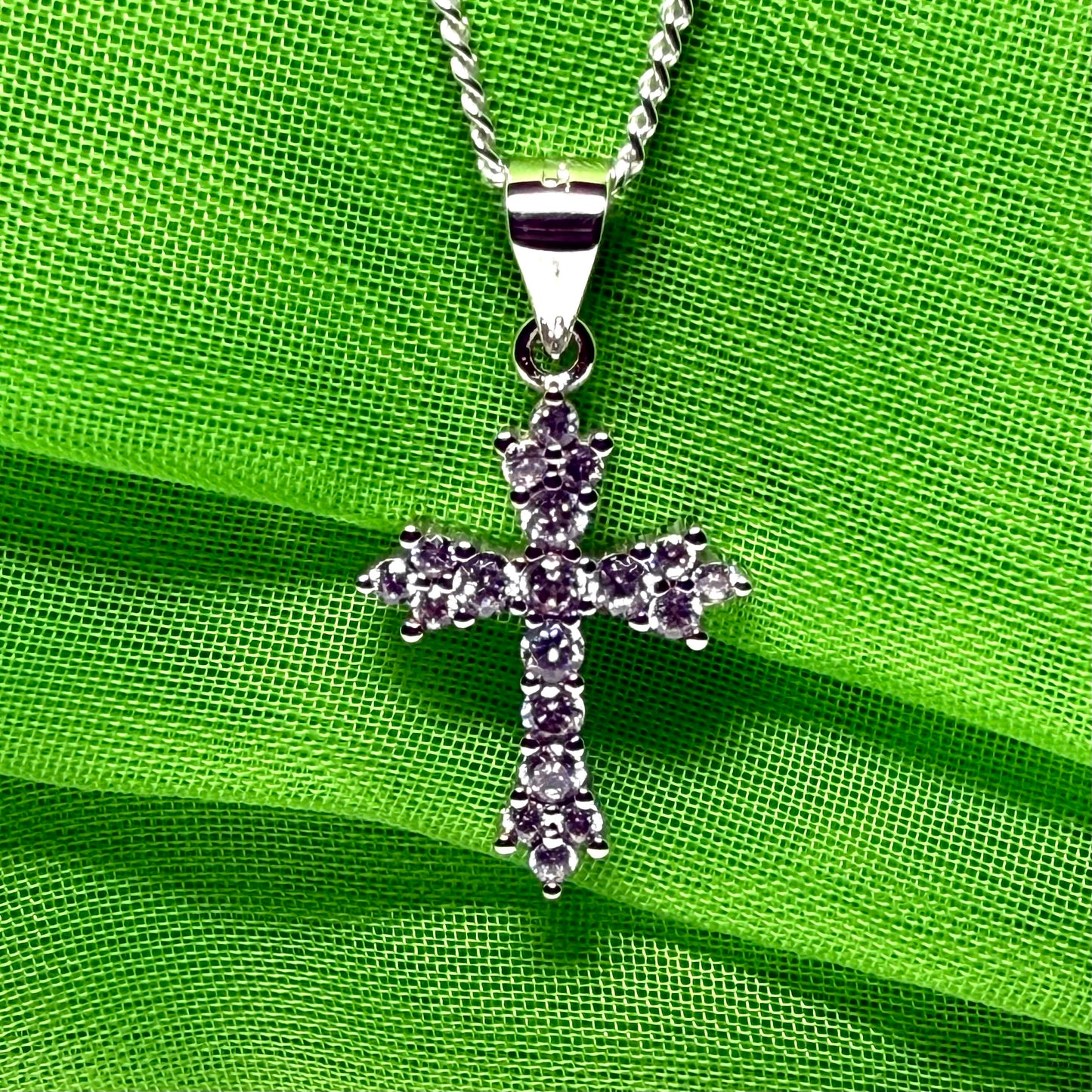 Fancy cubic zirconia set sterling silver cross