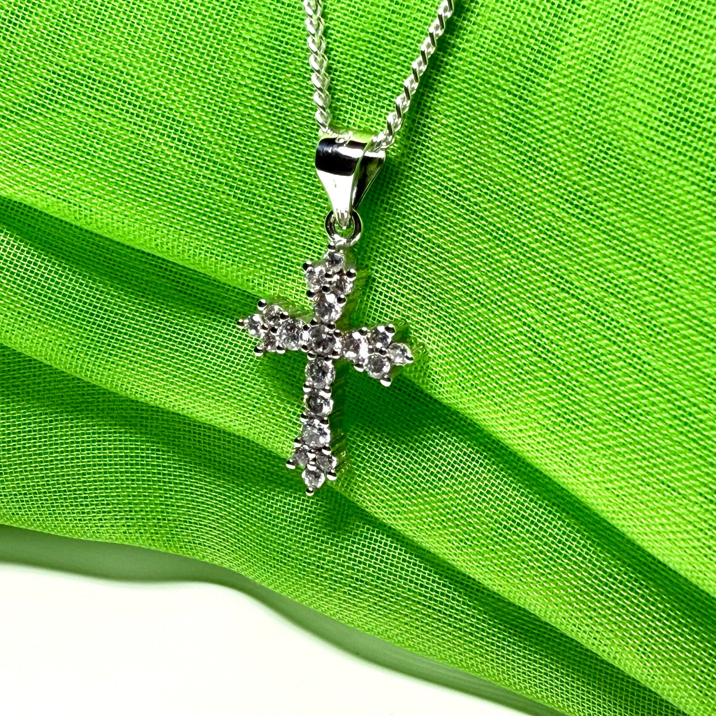Fancy cubic zirconia set sterling silver cross