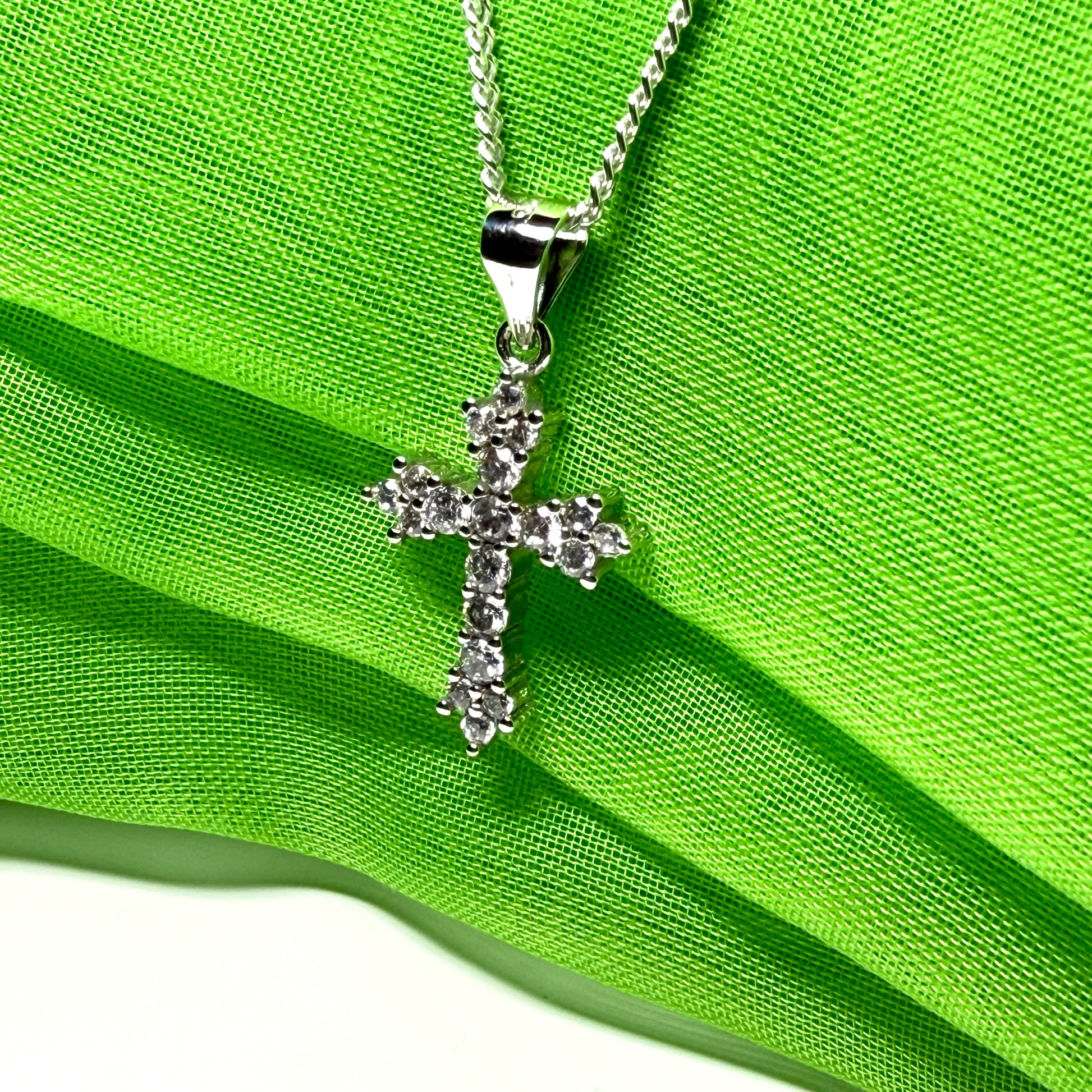 Fancy cubic zirconia set sterling silver cross