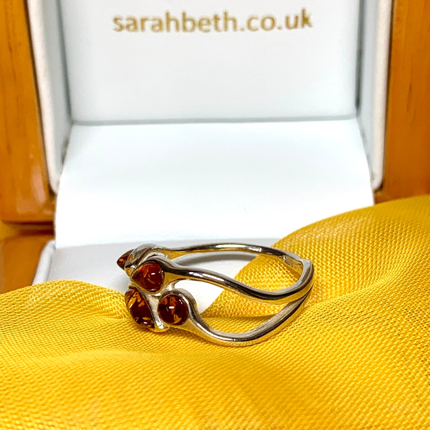 Twisted fancy sterling silver orange real amber ring