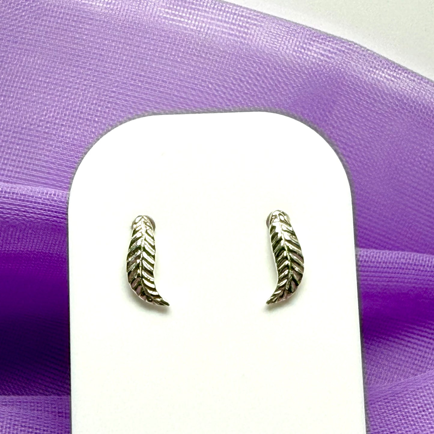 Feather shaped stud earrings sterling silver