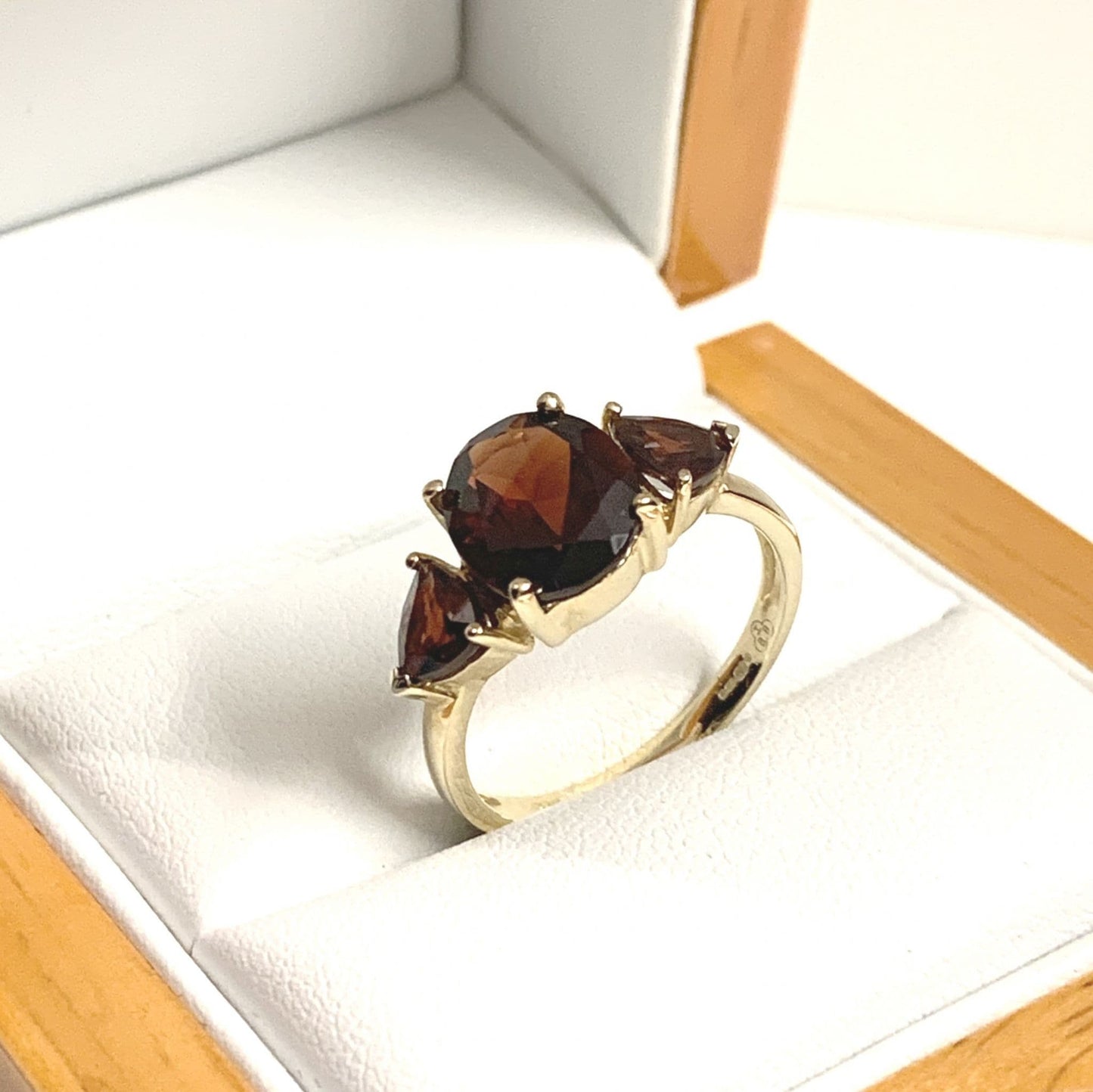 Real garnet trilogy dress ring yellow gold