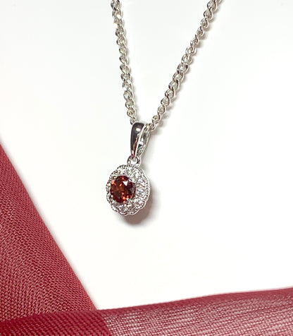 Garnet and cubic zirconia necklace sterling silver round dress cluster pendant