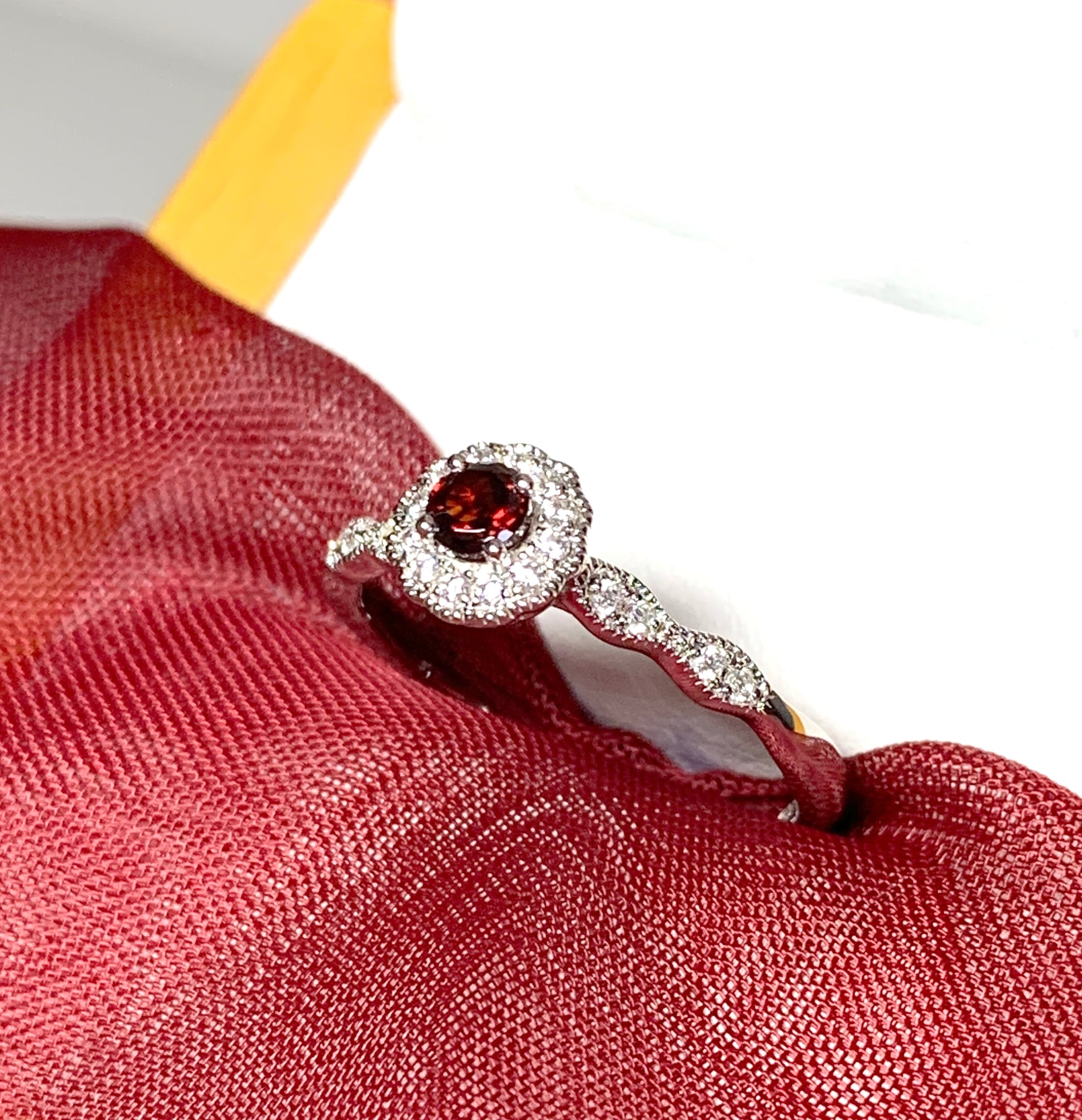 Garnet and cubic zirconia sterling silver round dress cluster ring