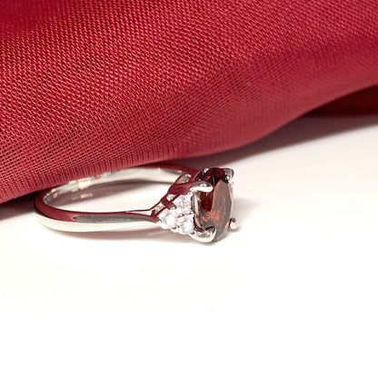 Garnet and cubic zirconia sterling silver oval dress ring