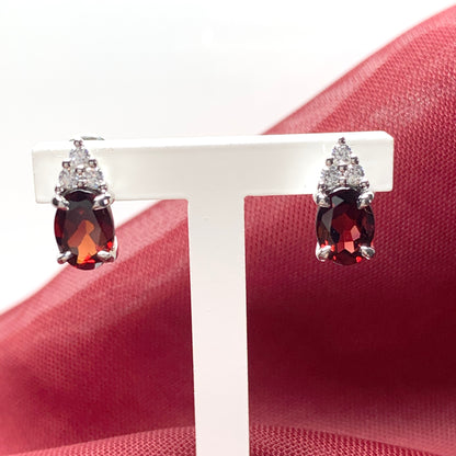 Garnet and cubic zirconia sterling silver oval earrings