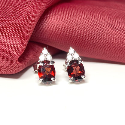 Garnet and cubic zirconia sterling silver oval earrings