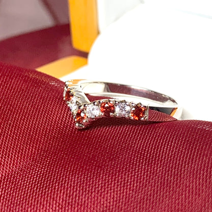 Garnet coloured wishbone ring sterling silver with cubic zirconia stones