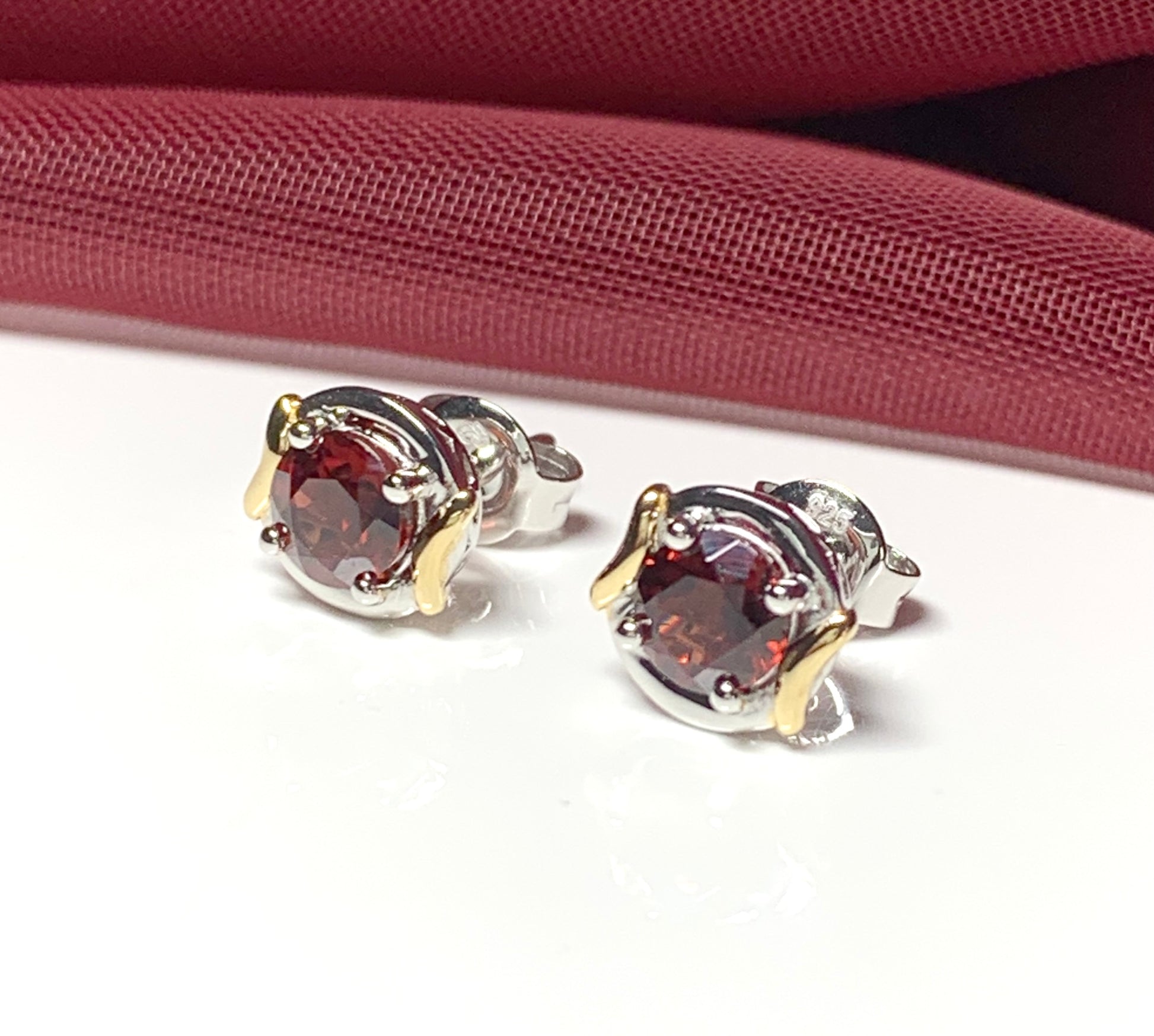 Garnet two tone sterling silver and silver gilt round stud earrings